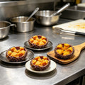 Amber sea urchin roe served in natural spiky shells