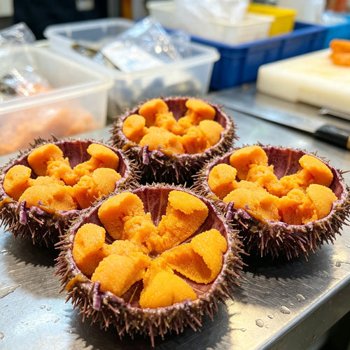Sea urchin roe portions presented on a wooden board
